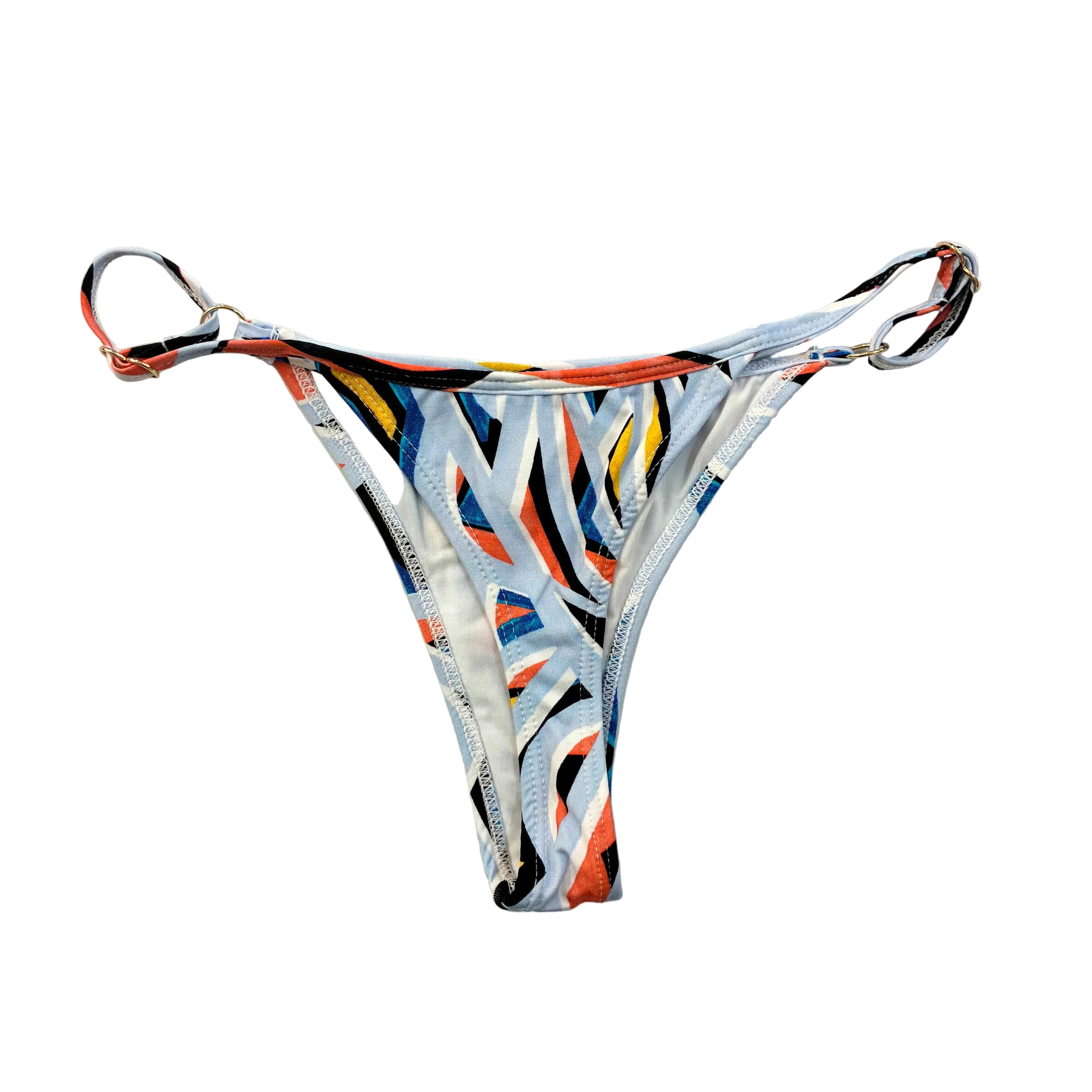 Trasero de braga de bikini tanga de rayas abstractas celestes fabricada en Tarifa