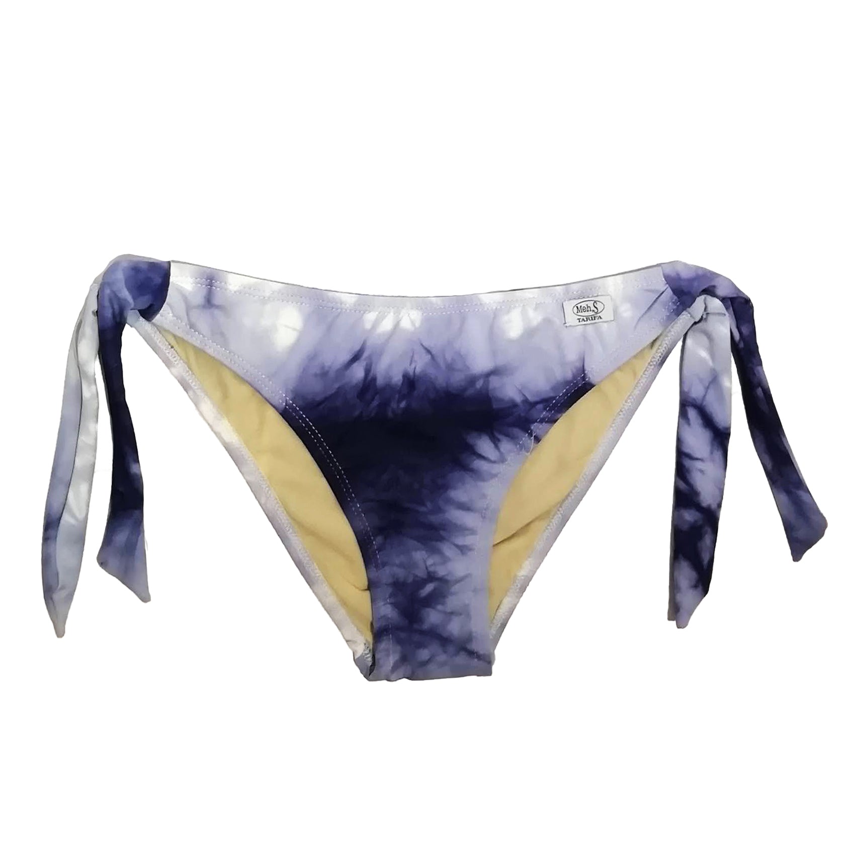Braga de bikini ajustable con lazos laterales y estampado tie-dye en tonos azul índigo, hecha a mano en Tarifa.