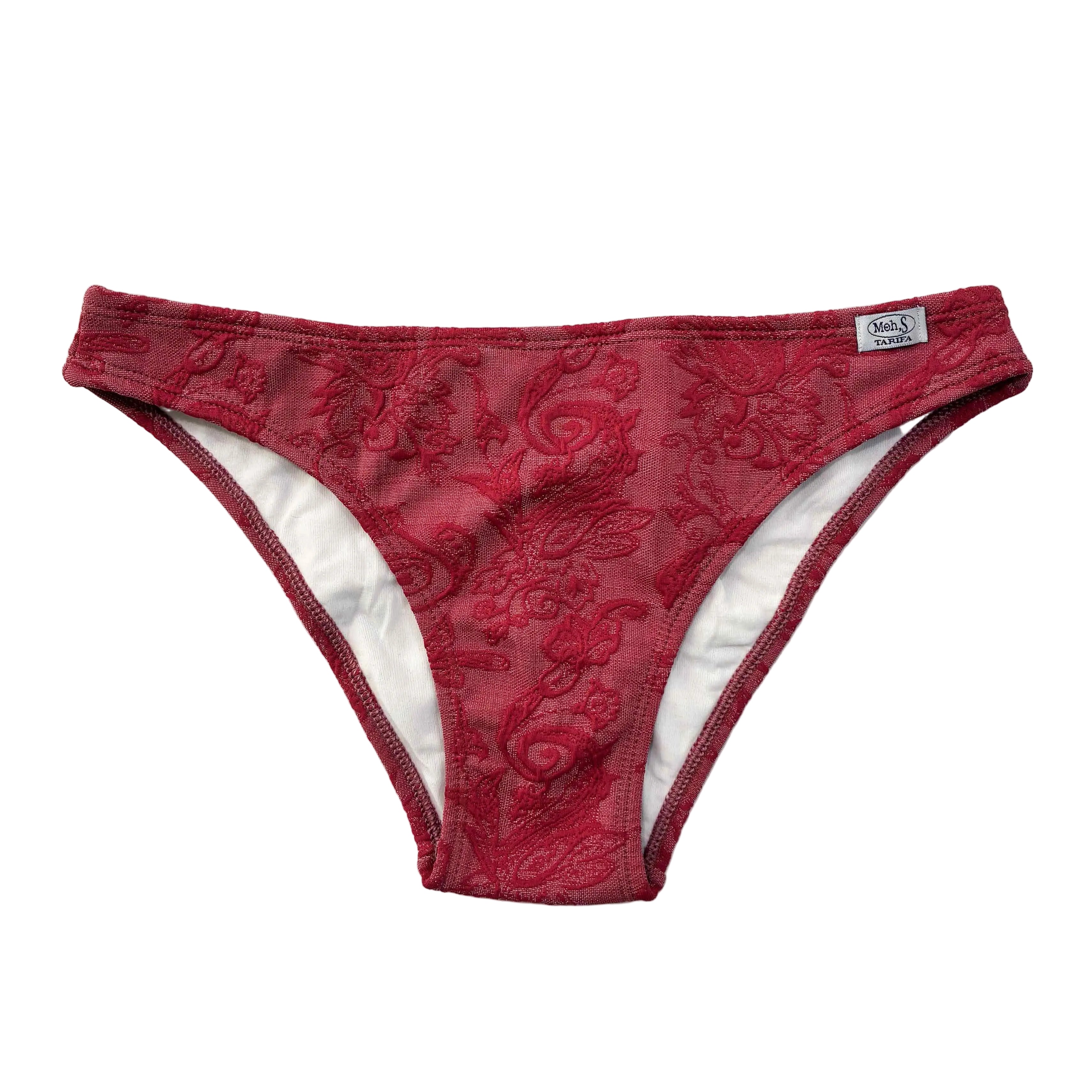 Braguita de bikini básica de corte clásico en color burdeos con tejido adamascado floral y etiqueta Moh.S Tarifa.