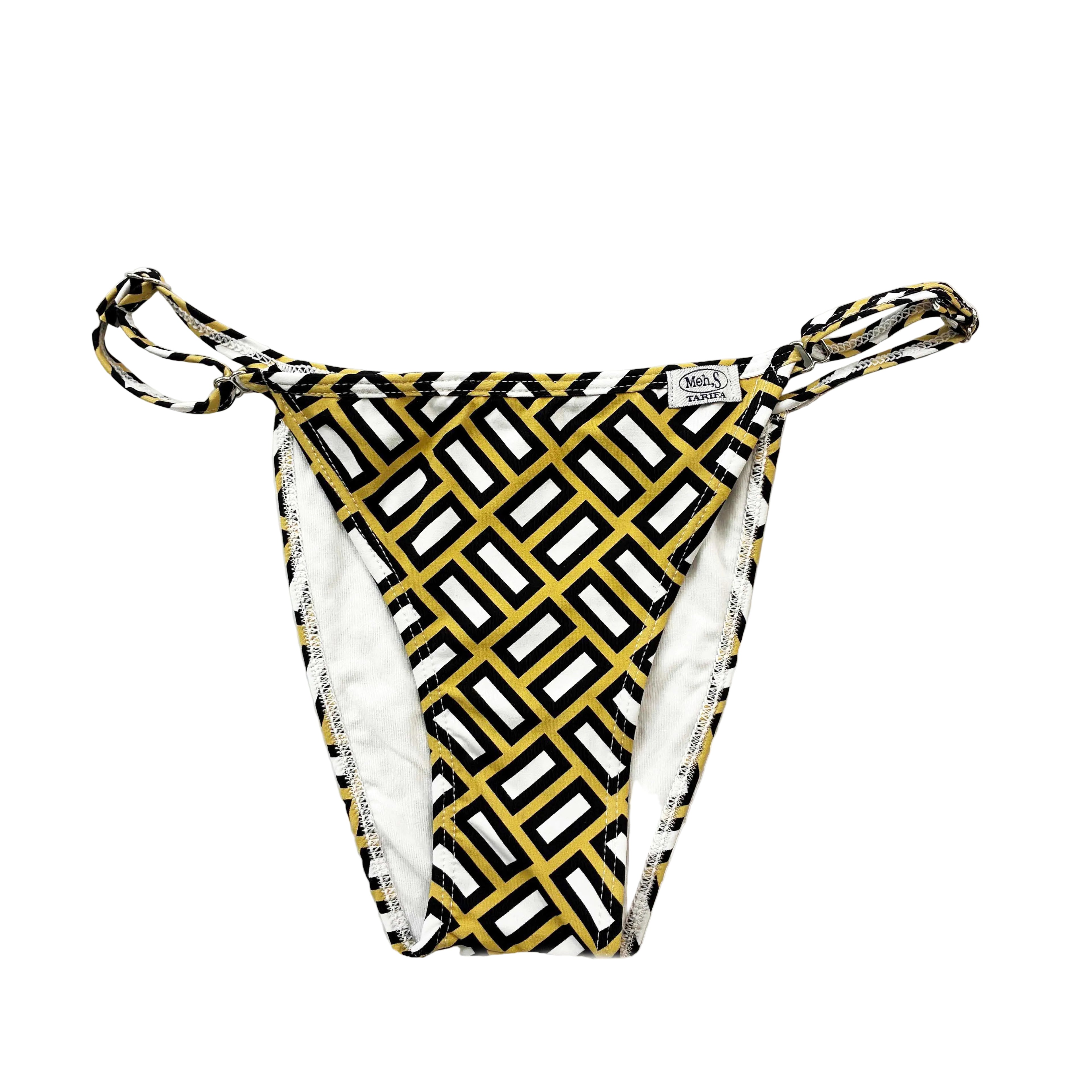 Braga de bikini brasileña con estampado geométrico en tonos amarillo y negro, diseño artesanal Moh,S Tarifa.