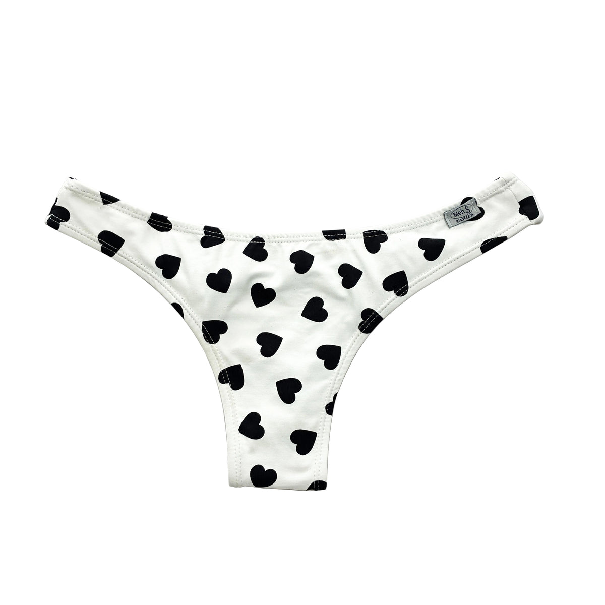 Braga de bikini semitanga en blanco con corazones negros.