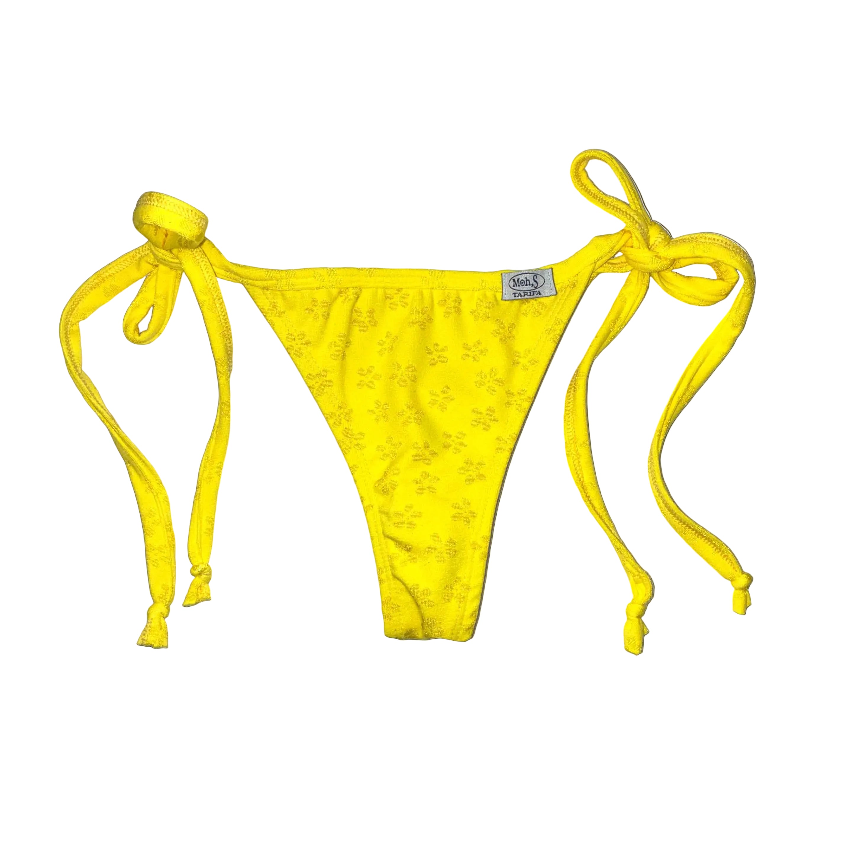 Tanga atada de bikini amarilla con flores  texturadas fabricada artesanalmente en Tarifa.