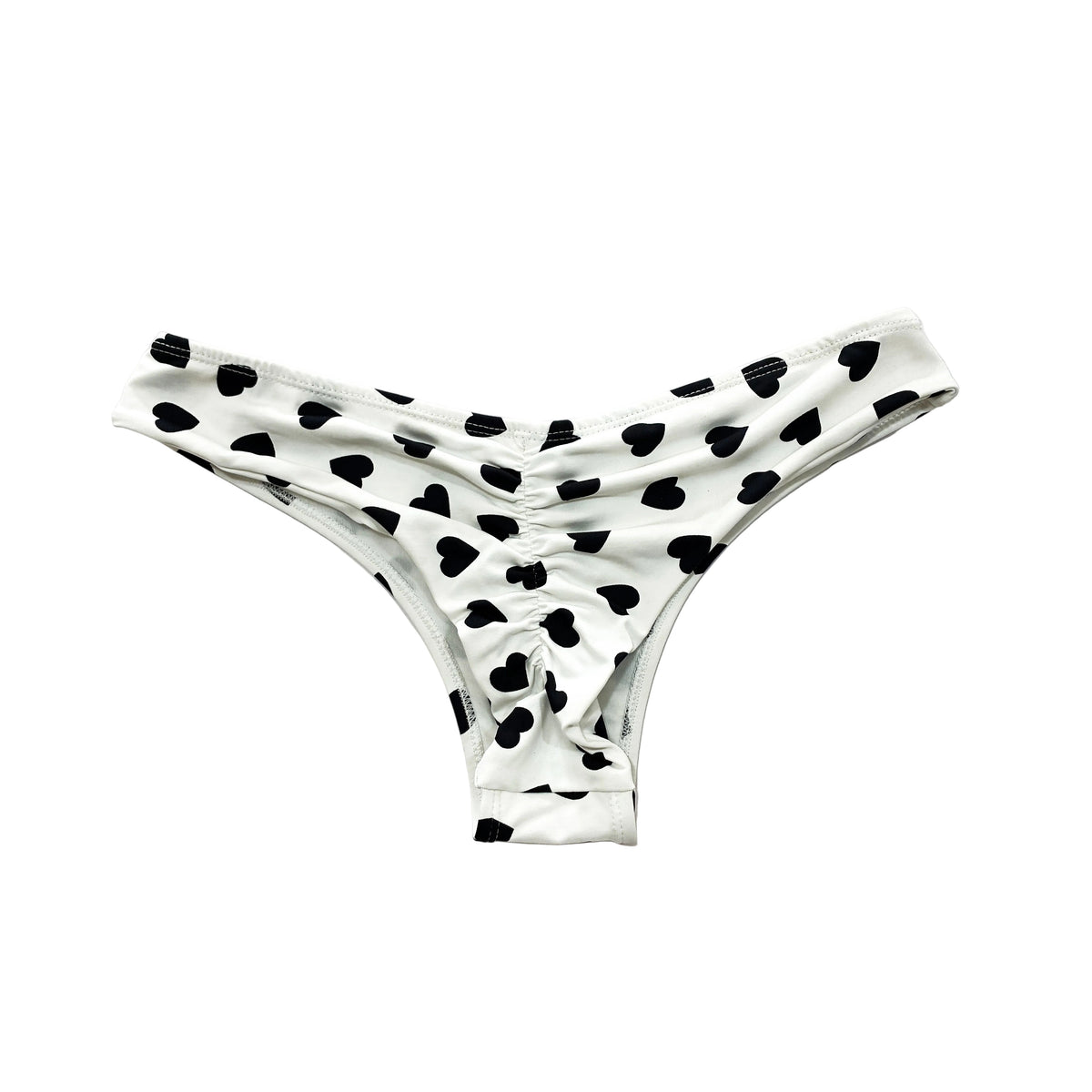 Trasera de braga de bikini semitanga en blanco con corazones negros.